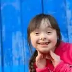 smiling girl with special needs