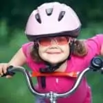 young girl on bicycle