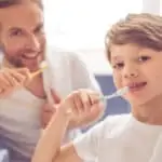 boy brushing teeth